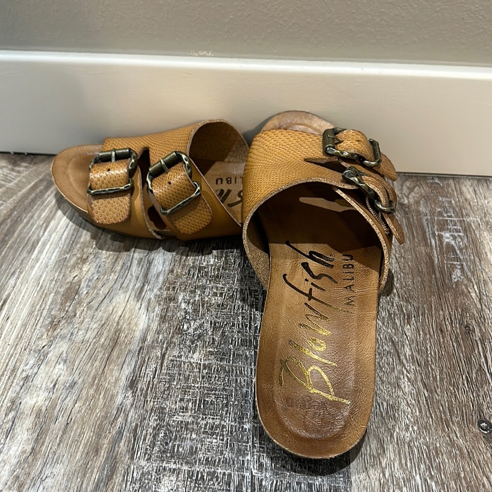 Sandals. Blowfish buckle sandals. Worn 2-3 times. Size 7. Excellent condition